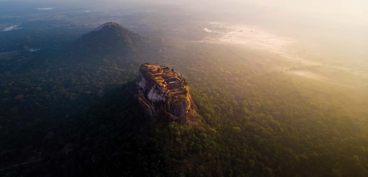 Sunrise over Sigiriya rock fortress in Sri Lanka