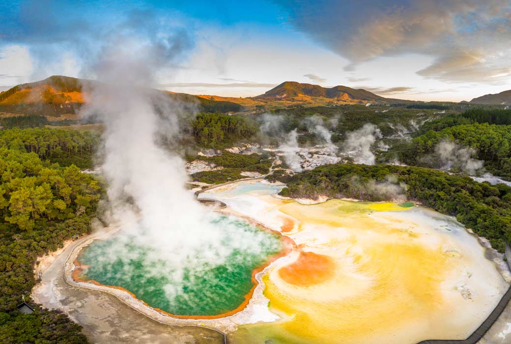 Geothermal Landscape with hot boiling mud and sulphur springs due to volcanic activity in Wai-O-Tapu, Thermal Wonderland New Zealand