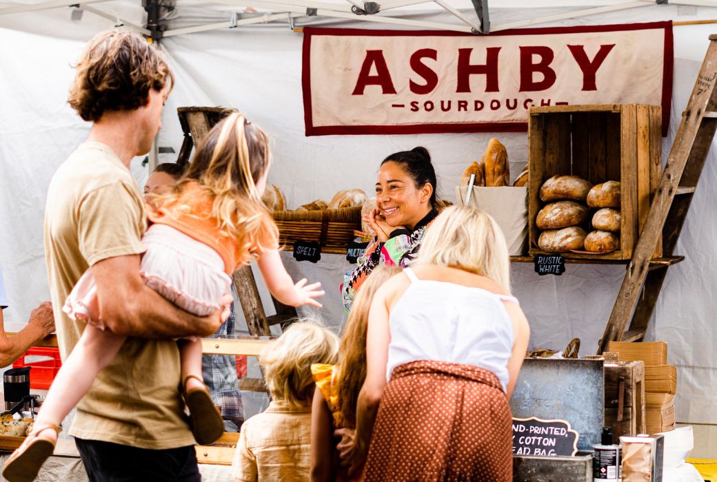 family at bread stall
