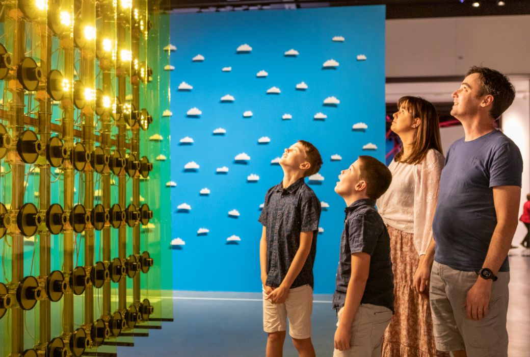 Family looking at art installation in HOTA Surfers Paradise