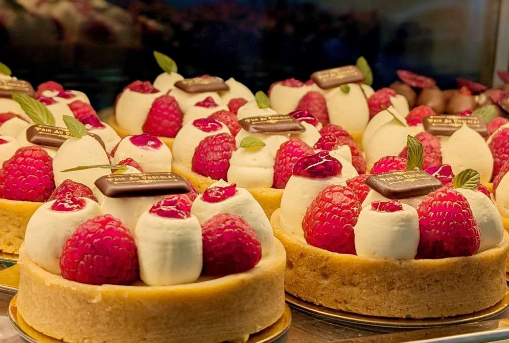Raspberry pastries in shop display window