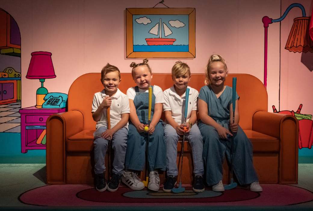 Kids in a Simpsons-themed room at Holey Moley in Surfers Paradise