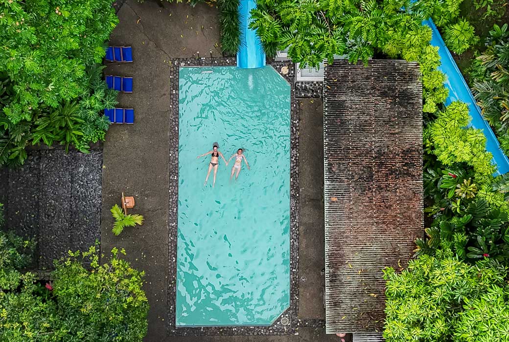 The swimming pool at Koro Sun Resort has a slide