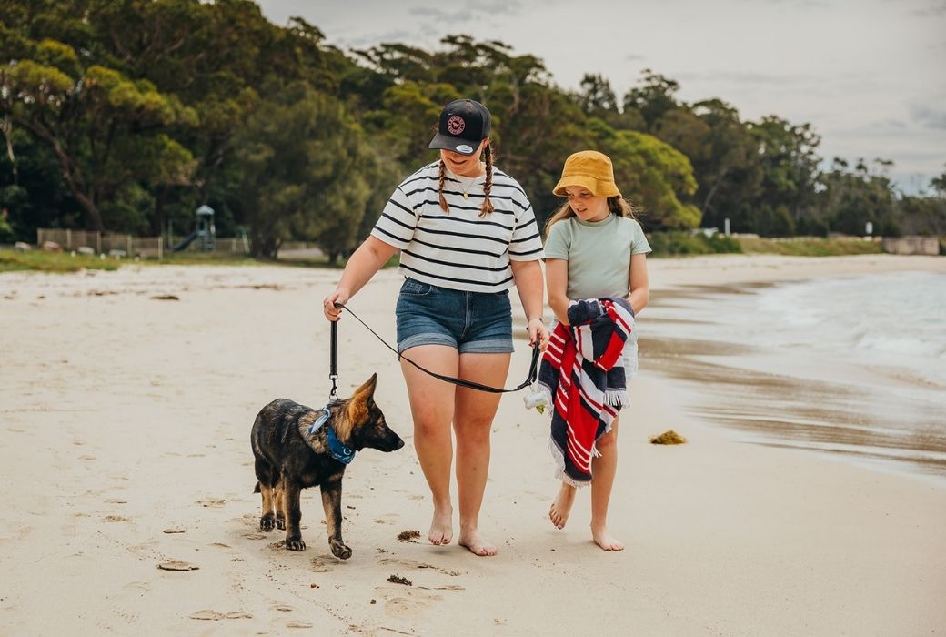 family on beach for Holiday Haven dog-friendly Holiday Parks in NSW